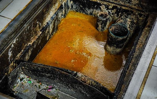 many cities and states have regulations and laws that require regular grease trap cleaning for restaurants